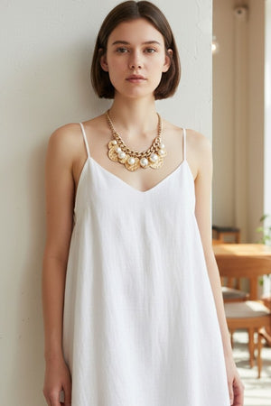 MULTI HAMMERED DISK AND PEARL BIB NECKLACE SET