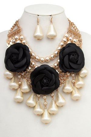 FAUX LEATHER FLOWER DANGLE BIB NECKLACE SET