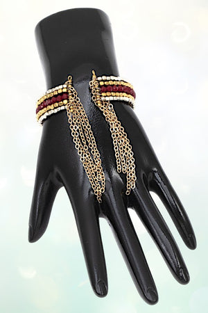 MULTI BEAD CHAIN TASSEL END CUFF BRACELET
