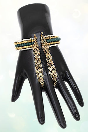 MULTI BEAD CHAIN TASSEL END CUFF BRACELET
