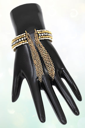 MULTI BEAD CHAIN TASSEL END CUFF BRACELET