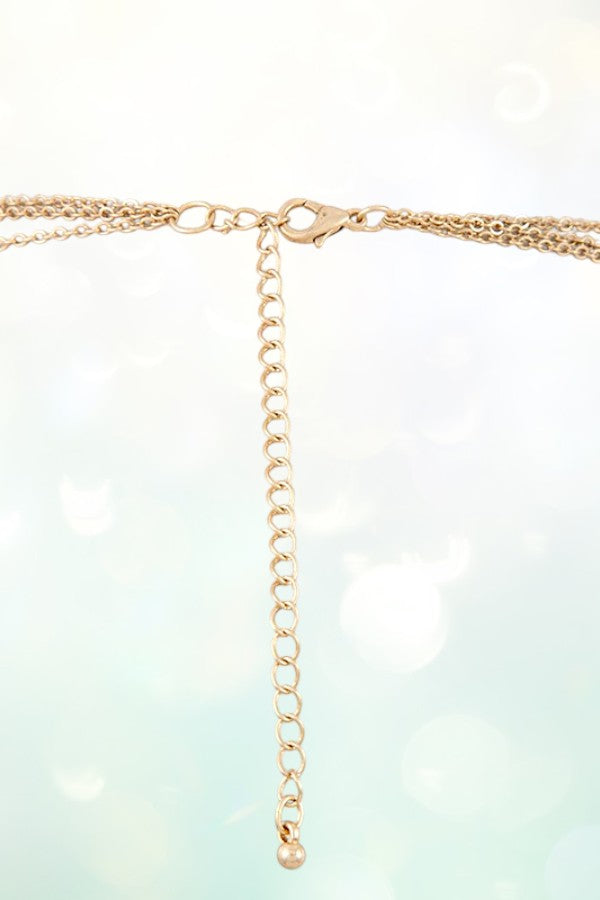 DISK LAYERED CROSS PENDANT NECKLACE