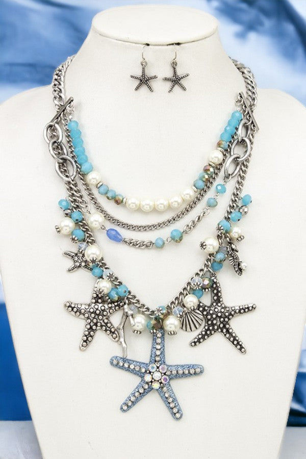 MULTI LAYERED PEARL AND BEAD STAR NECKLACE