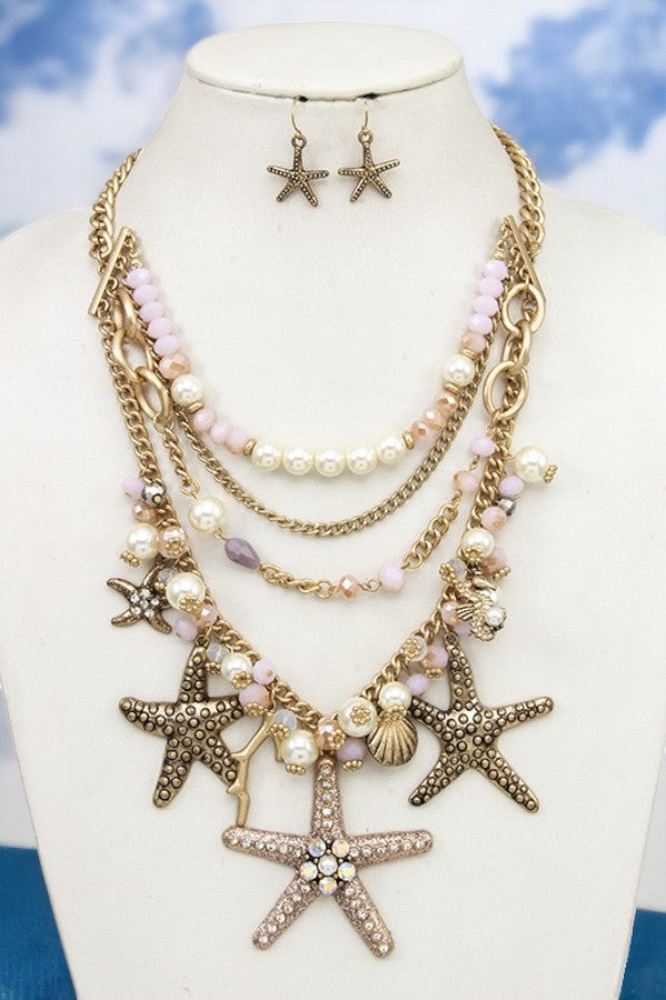 MULTI LAYERED PEARL AND BEAD STAR NECKLACE