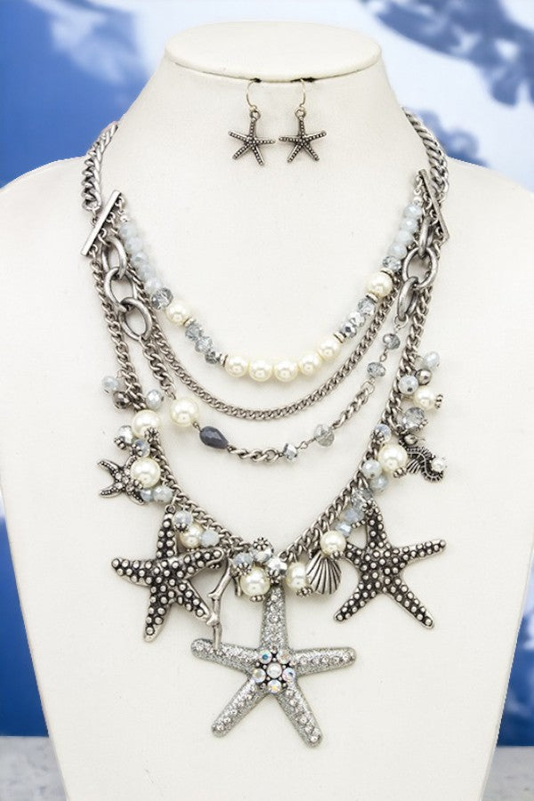MULTI LAYERED PEARL AND BEAD STAR NECKLACE
