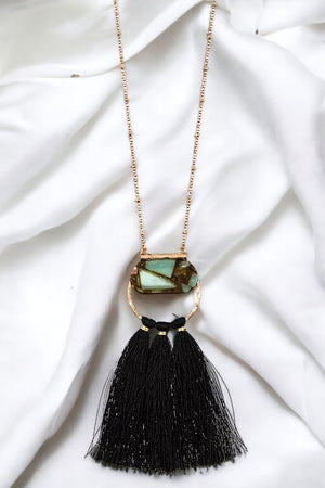 Elongated Round Pendant Tassel Necklace