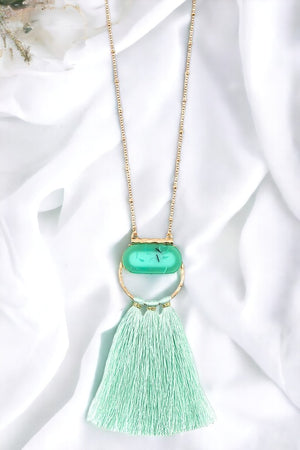 Elongated Round Pendant Tassel Necklace