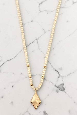 DELICATE BEADED NECKLACE WITH GOLD DIAMOND SHAPED PENDANT