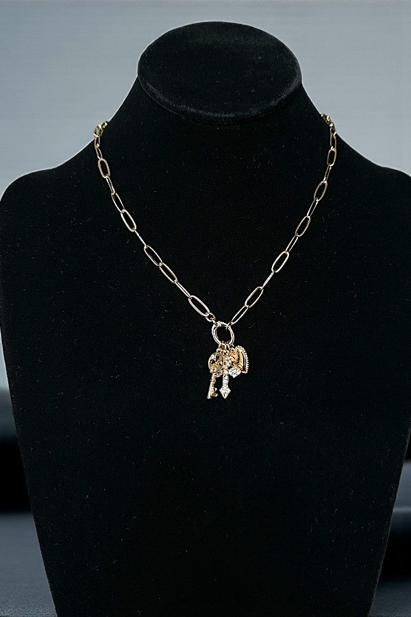 RHINESTONE PAVE CROSS MULTI CHARM NECKLACE