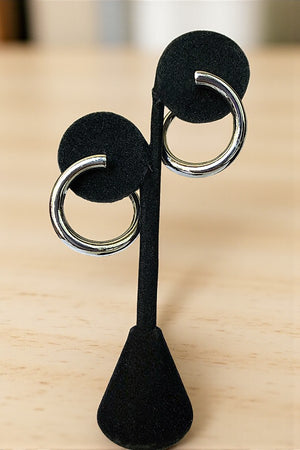 SMOOTH FINISH TWISTED SEMI HOOP EARRING