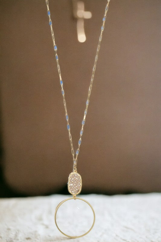 Elongated Ring Bead Pendant Necklace