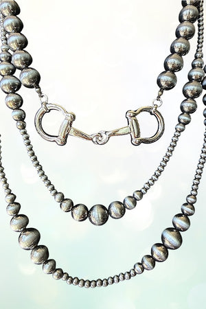 SNAFFLE BIT ACCENT NAVAJO PEARL 3 LAYERED STATEMENT NECKLACE